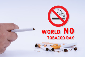 Man hold a cigarette with his hand. Stop smoking campaign. World no tobacco day.