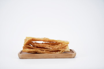 The candied beancurd sticks are in the white background
