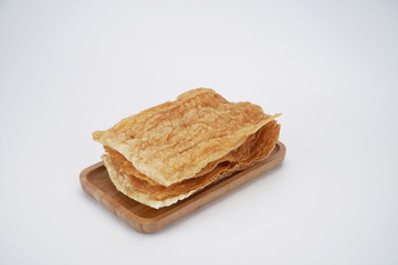 The candied beancurd sticks are in the white background