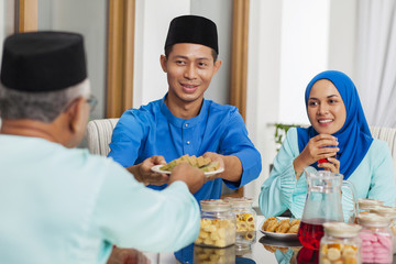 Muslim family feasting during the Eid celebration