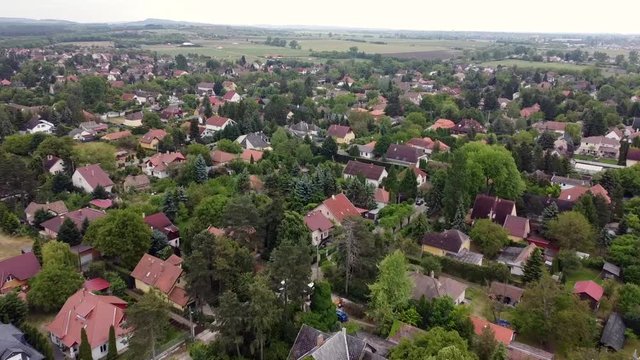 Aerial Scene. We Are Flying Over Little Hungarian Town. Its Name Is Göd. You Can See Houses And Roads. Not So Many People, Because It Is Still Quarantine Here.