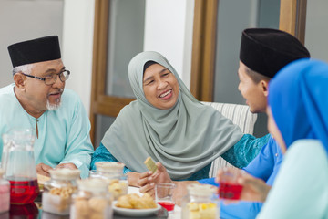 Muslim family chatting during Eid al-Fitr