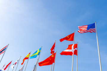 Flagpole international global with blue sky background