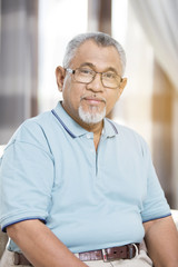 Senior man looking at camera