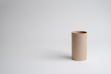 TOILET PAPER TUBE TO RECYCLE WITH WHITE BACKGROUND