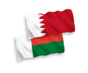 Flags of Madagascar and Bahrain on a white background