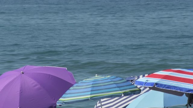 Colours umbrellas a summer day in the beach
