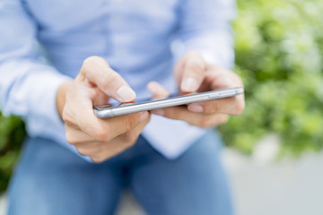 Man playing game on a mobile phone