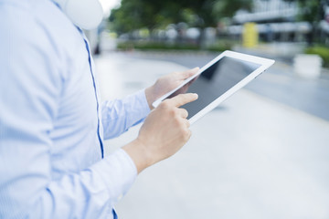 Man using a digital tablet