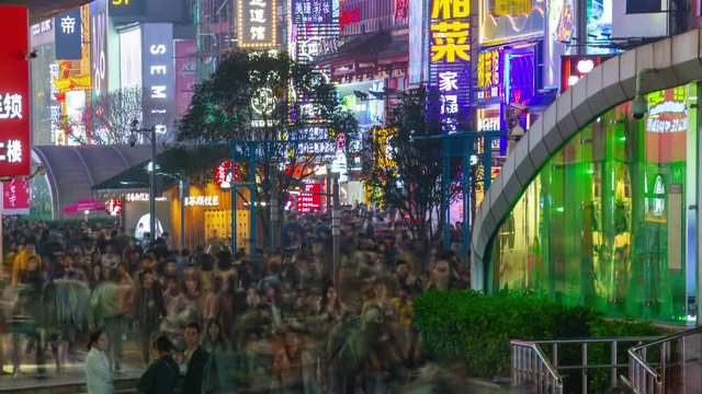 changsha city downtown night time illuminated crowded pedestrian street rooftop panorama timelapse 4k china