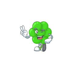 smiling staphylococcus aureus cartoon mascot style with two fingers