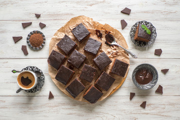 Chocolate brownie cake, dessert on white wooden background