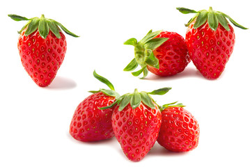 Fresh ripe strawberries isolated over white background - colorful bright strawberries concept 
