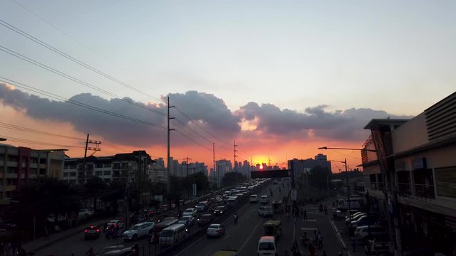 The rush hour traffic jam in the Philippines, wherein many vehicles are in the road just to reach their homes. Taken during sunset.