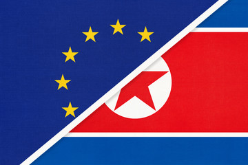 European Union or EU and North Korea national flag from textile. Symbol of the Council of Europe association.
