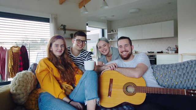 Group of young people moving in new home, house sharing concept.