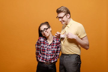 funny students in love on a yellow background