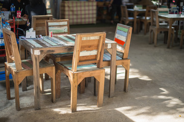 Fototapeta na wymiar closeup of vintage table and stool set in food shop