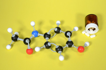 Molecule model of Paracetamol, the active ingredient in many pain killers. White is Hydrogen, black...