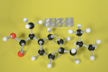Molecule model of Ibubrofen, the active ingredient in many pain killers. White is Hydrogen, black...