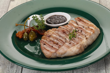 Grilled pork steak with pepper sauce