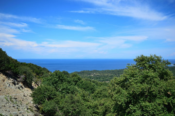 view from the top of the mountain to the coast of the sea over forest in Therma area,  Samothraki island, Greece, Aegean sea