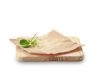 Wooden dish board with paper to advertise food.Plate isolated.