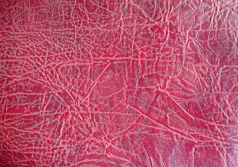 the surface of red leather as background