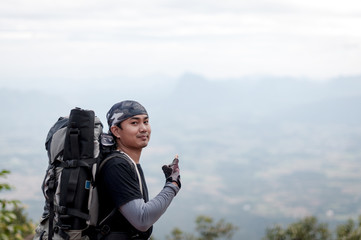 Man traveler portrait with landscape on mountain