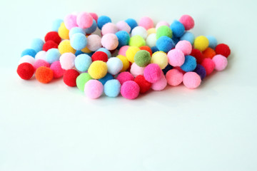 Soft fluffy pompoms for needlework. Bright balls of fur for decor. 