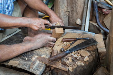 closeup of sculptor man with him job