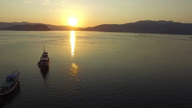 sunset and the boat on labuan bajo 