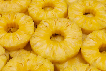 Many pineapple rings close up
