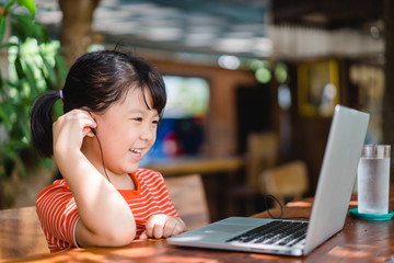 Asian student girl online learning class study.Online video call zoom teacher, Happy girl learn...