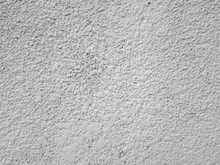 Putty concrete wall, spray cement concrete finisher. The texture of the background, spontaneously imposed on the wall is cement plaster. Abstract background.
