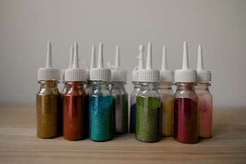 jars of  glitter for makeup, nail art and temporary tattoos 