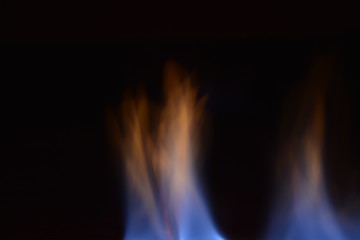 blue flames on black background