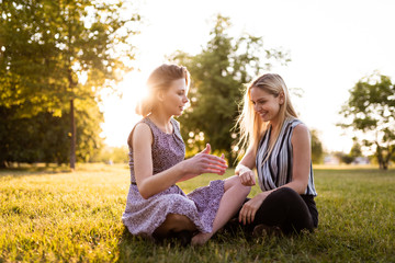 Women in park having a healthy discussion