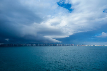 Fototapeta na wymiar Fortaleza Beach covered by heavy rain clouds.