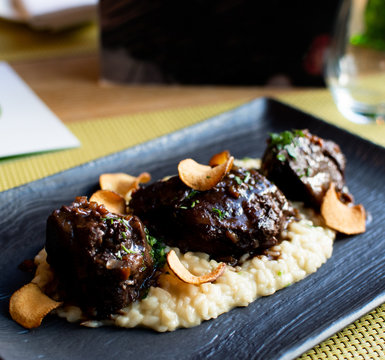 Ossobuco or osso buco is a cross-cut veal shanks