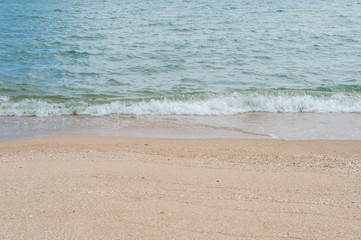 Fototapeta na wymiar Background of the beach with sea wave