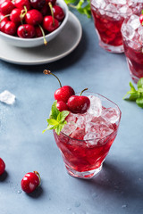 Summer alcholic coktail with cherry