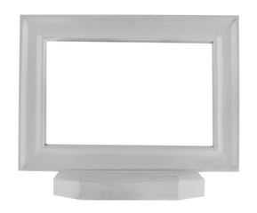 White photo frame isolated on white background close-up.