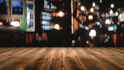 wooden table in front of abstract blurred background,3d rendering,conceptual image.