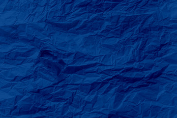 Surface Blue color crumpled paper close up texture background