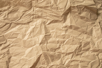Brown crumpled paper close up texture background