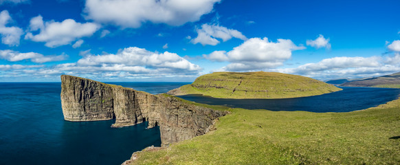 Sorvagsvatn lake over the ocean ultra wide panorama