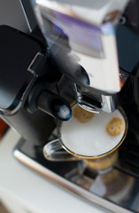 The home coffee machine, makes coffee, cappuccino, stylish home appliances, we make delicious coffee for yourself