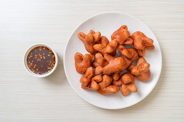 fried sausage with dipping sauce