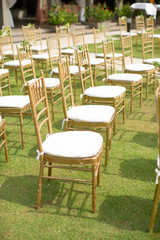 Beautiful and rustic garden wedding setup on a sunny day during summer.